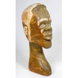 A 20th century Zimbabwe School carved soapstone head of a gentleman - height 34cm.