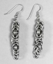 A pair of silver ear pendants - of cluster chain links, weight 13g.