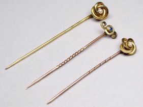 A 15ct gold and pearl set stock pin - in the form of a knot with pearl to centre, together with