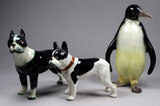 A model of a French bulldog - black and white, height 11cm, together with another and a model of a