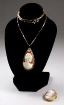 A 20th century drop shaped cameo pendant - set in an 18ct gold frame, with a fine 9ct gold chain,