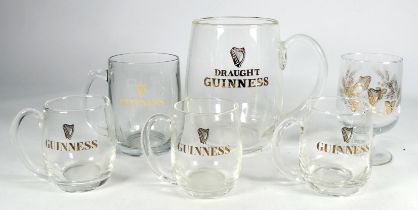 A Guinness branded quart tankard - clear glass with gilt branding, height 17cm, together with a pint