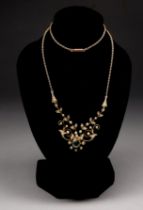 A 15ct gold Belle Epoque necklace - set with seed pearls and aquamarine in a foliate design on a