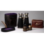 A pair of late 19th century field glasses - leather clad barrels and case, together with a pair of