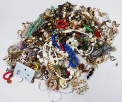 A quantity of costume jewellery - mainly earrings and brooches.