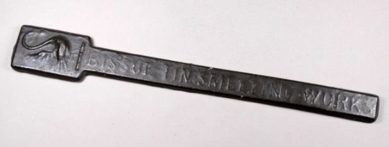 A Bissoe Tin Smelting Works tin ingot rod - cast with trade mark swan, length 32cm.