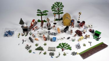 A quantity of lead farm animals - mostly mid 20th century, together with flowers and trees. (qty)