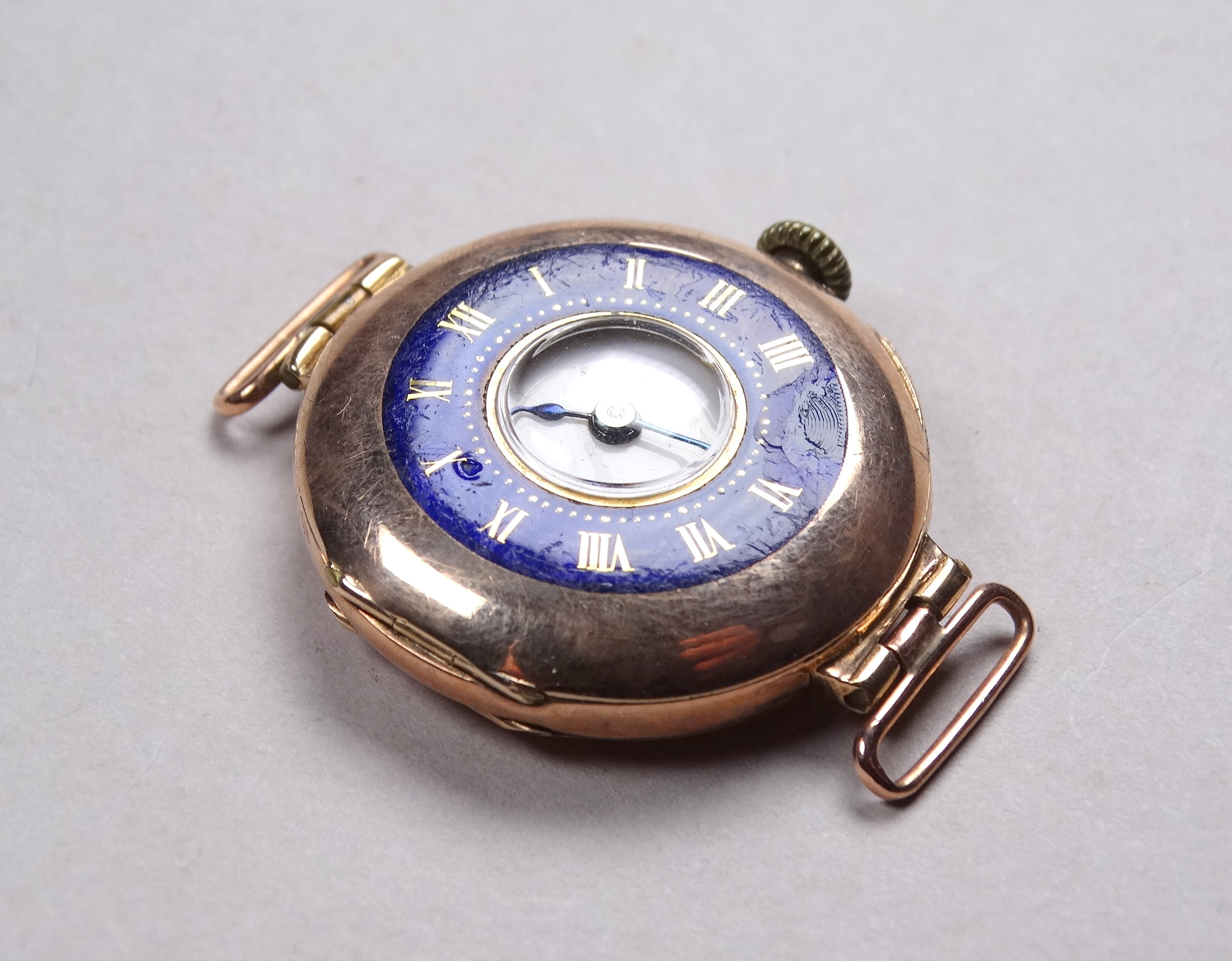 An early 20th century 9ct gold cased wristwatch - with a white enamel chapter ring set out in - Image 3 of 4