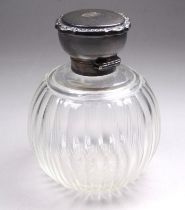 A silver mounted fluted glass scent bottle - Birmingham 1922, globe shaped with an engine turned