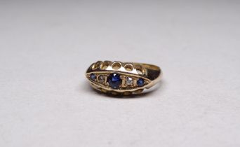 An 18ct gold sapphire and diamond ring - with five alternate graduated stones, size O, weight 3.7g.