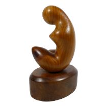 Michael SIMPSON (British b. 1951) Female form, raised on an oval base Carved yew Impressed