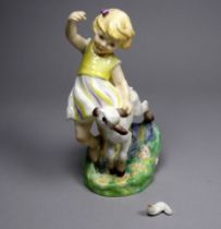 A Royal Worcester figure of April - modelled by F G Doughty, the figure with a lamb, height 15cm.