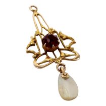 A garnet set yellow metal pendant - in the belle epoque style with a mother-of-pearl drop, 0.8g