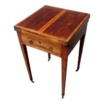 A 19th century mahogany table - with satinwood banding, the central divided hinged top opening to