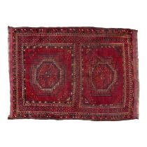 A Tekke rug - with two guls on a red ground - 144 x 103cm