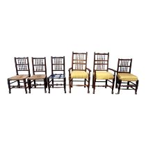 A harlequin set of six ash spindle back chairs - including two with open arms, with peripheral