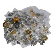 A quantity of costume jewellery - including cufflinks, brooches, necklaces, clips etc.