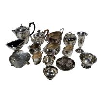 An early 20th century silver plated bachelor tea service - part gadrooned, tea pot with a wicker