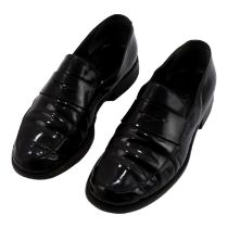 A pair of Prada loafers - black patent leather, size 37