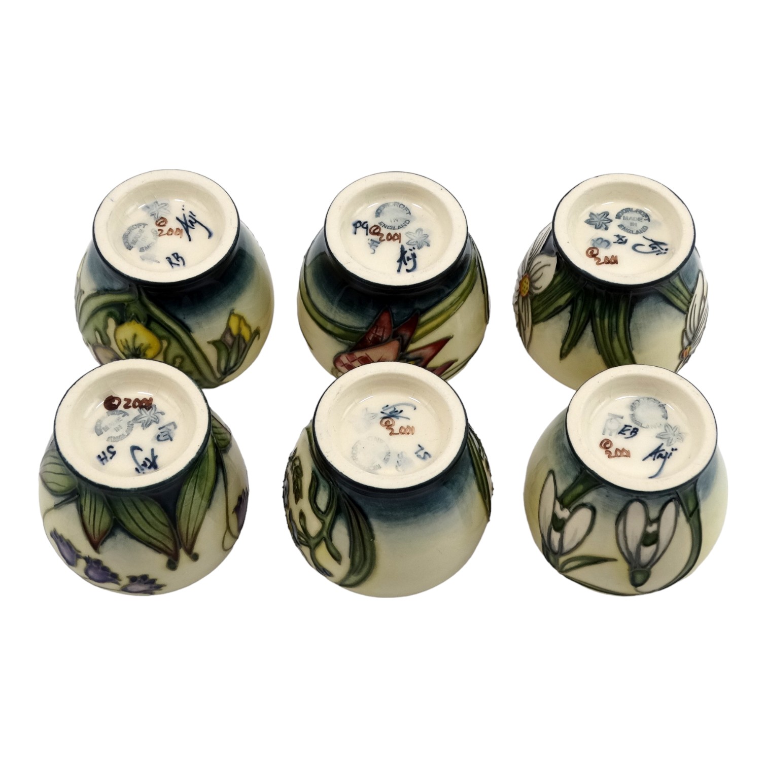 A boxed set of six Moorcroft Pottery eggcups - tubeline decorated with flowers, comprising 'Snakes - Image 4 of 5