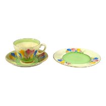 A Clarice Cliff crocus pattern cup and saucer - decorated with green bands, together with a side