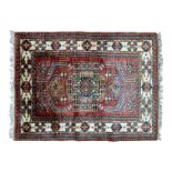 A small Persian mat - possibly Shirvan, 110 x 85cm