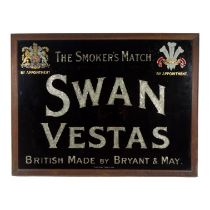 An early 20th century Swan Vesta advertising sign - glass, painted black with silver foil behind,