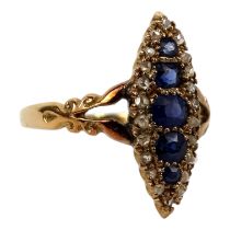 A sapphire and diamond ring - in a marquis setting on a yellow metal band, size S, 3.2g