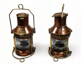 A pair of early 20th century copper and brass masthead lamps - with clear glass lenses, height 27cm.