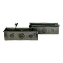 A pair of lead garden planters - of rectangular form, with ropetwist details to the tops and with