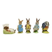 A Beswick model of Peter Rabbit, height 11cm, together with Mrs Flopsy Bunny and Mr Benjamin
