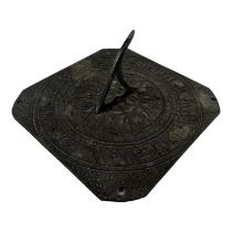 A 20th century brass sundial - with a weathered finish and dated 1667, 24 x 24cm.