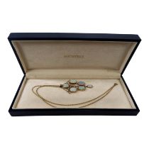 A Belle Epoque 15ct gold and opal set necklace - the five cabochon cut stones arranged between