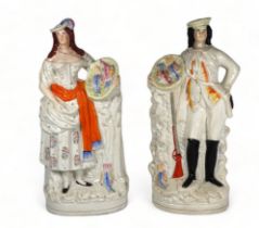A pair of 19th century Staffordshire figures - huntsman with a brace of gamebirds, height 39cm,