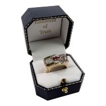 An Art Deco diamond and ruby set ring - the principal rose-cut stone of approx. 1ct, with a