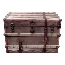 A late 19th century American travelling trunk - canvas covered with ash laths, steel fittings,