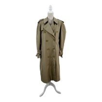 A Burberry trench coat - of classic colour and form, marked as Reg 48, together with a Burberry coat