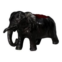 A late Victorian pewter novelty pin cushion - modelled as an elephant, width 10cm.