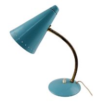 A mid 20th century desk lamp - baby blue, the conical shade pierced with a band of stars, on a brass