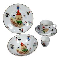 An Arklow Pottery nursery set - including a cup and saucer, a plate, a bowl and an egg cup.