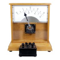 An educational laboratory mavometer - with large scale dial, in a hardwood case, height 36cm.