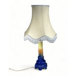 A Ruskin Pottery table lamp - yellow, orange and blue glazes, of tapering column form with a stepped