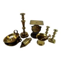 A small collection of 19th and 20th century brassware - including a pestle and mortar, scales and