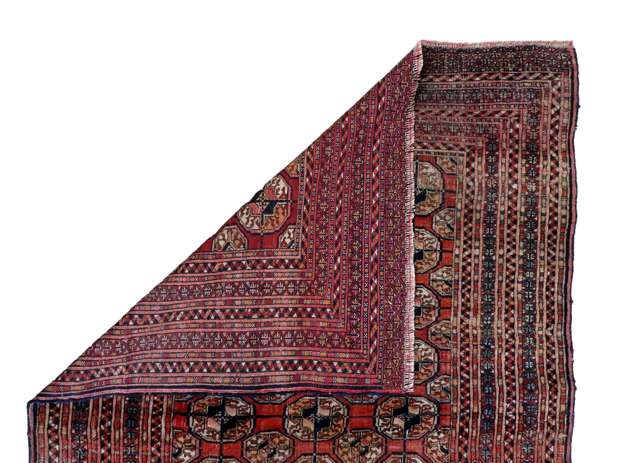 A Bokhara rug - decorated with an arrangement of gul motifs on a red ground, the border with - Image 4 of 4