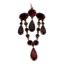 A 9ct garnet pendant - with an arrangement of circular, oval and pear-shaped drops, 4.1g