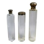 A silver topped scent bottle - London 1915, the bottle of cylindrical faceted form, together with