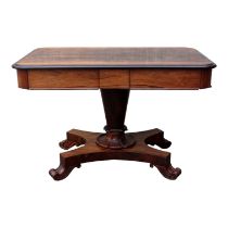 A William IV rosewood library table - the rectangular top incorporating two frieze drawers, on a