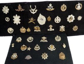 A collection of military badges - a variety of regiments.