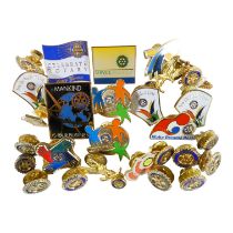 Twenty-seven various Rotary International pin badges. (27)