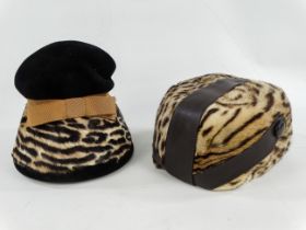 A ladies leopard skin hat - by Delores, with brown leather bands, together with another leopard skin